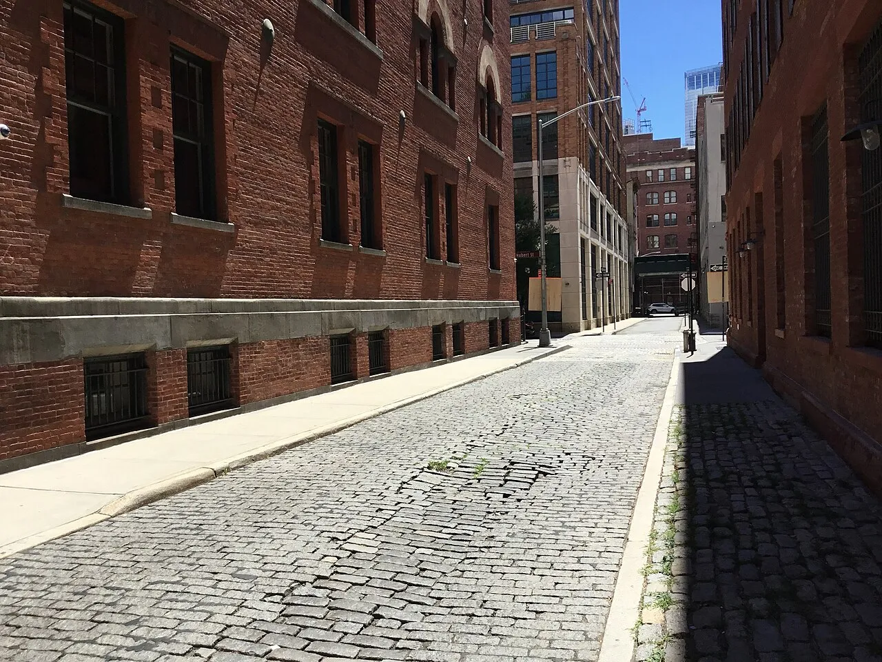 Tribeca cobblestone street lined with converted warehouse lofts that Maid Marines cleans