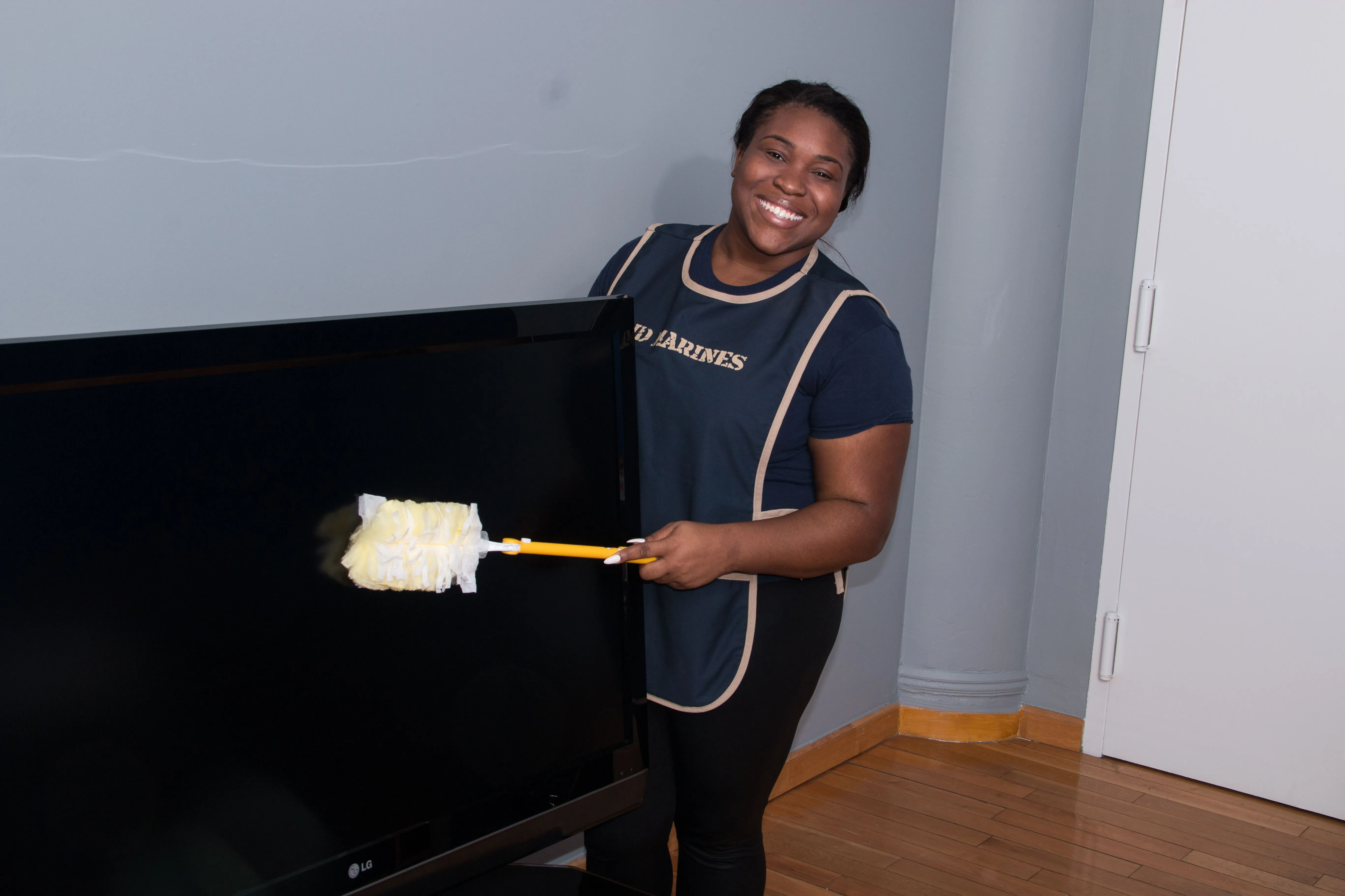 Maid Marines cleaner dusting