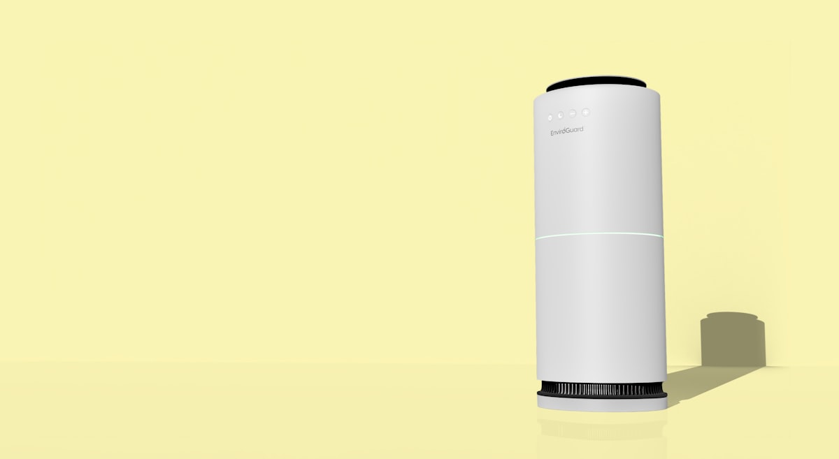 A white HEPA air purifier standing in a minimal apartment room