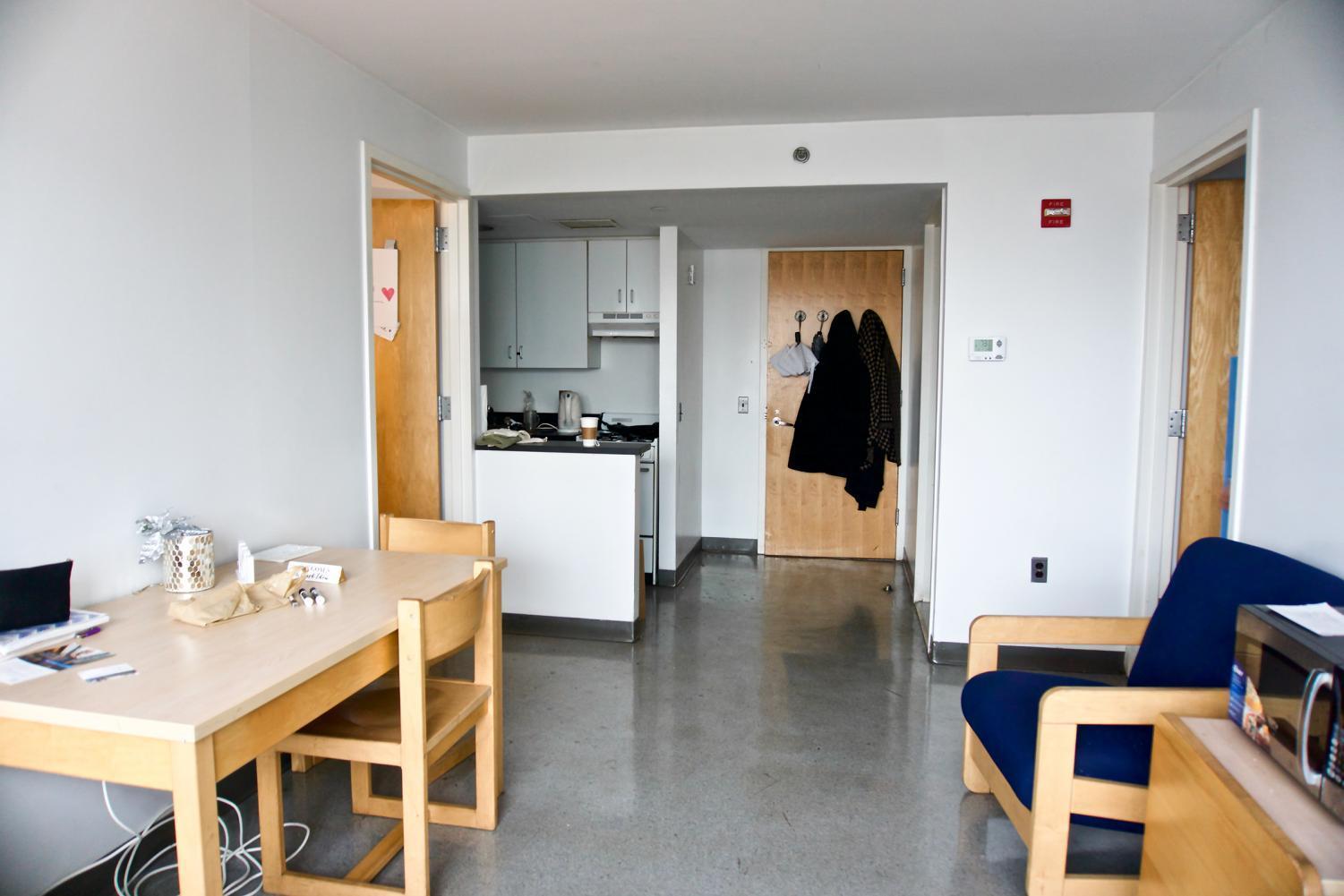 Inside an Othmer Hall apartment suite — kitchen, dining area, and living room