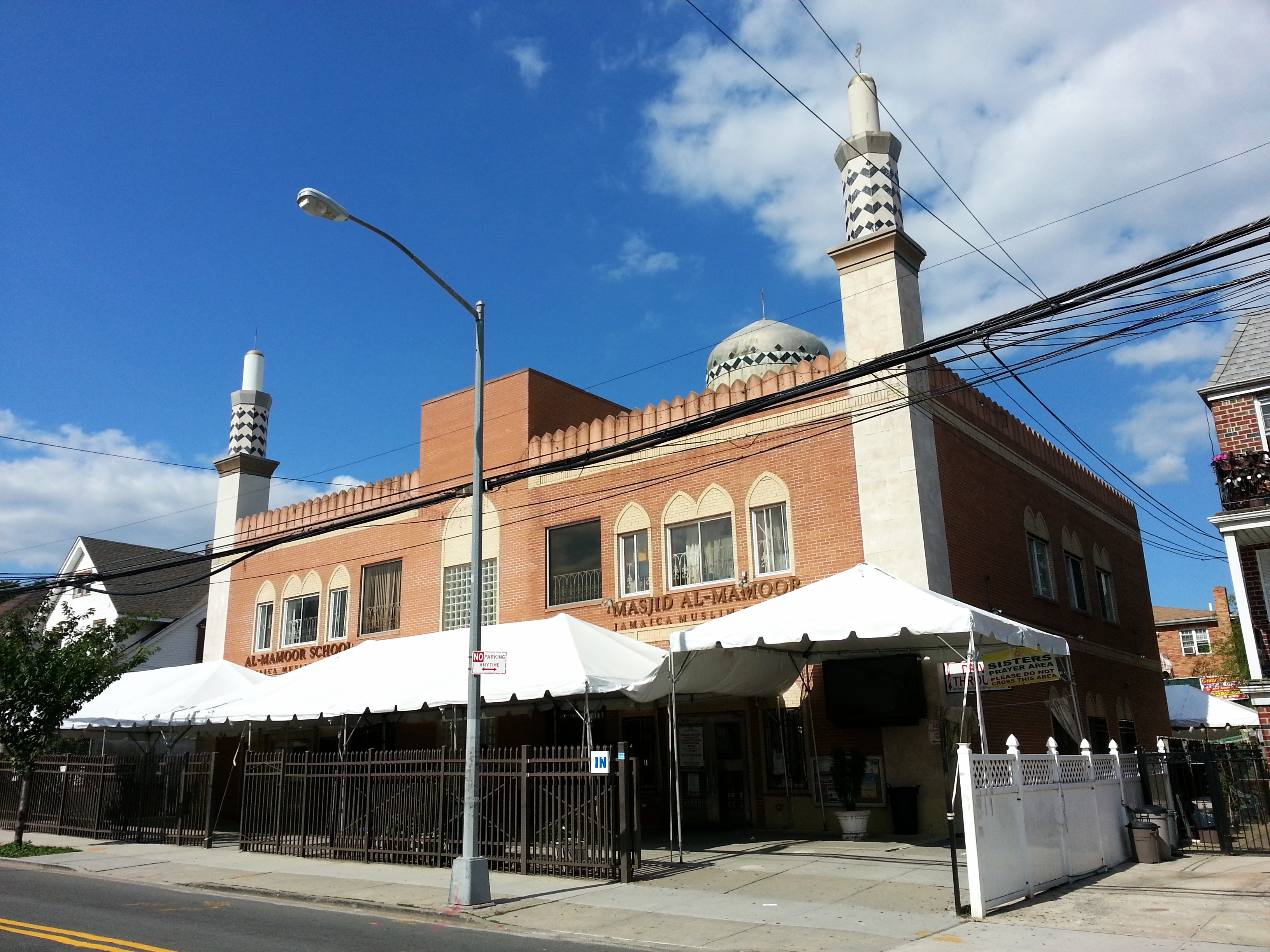 The Jamaica Muslim Center mosque exterior on Van Wyck Expressway in Briarwood Queens, one of the largest mosques in Queens serving the South Asian Muslim community