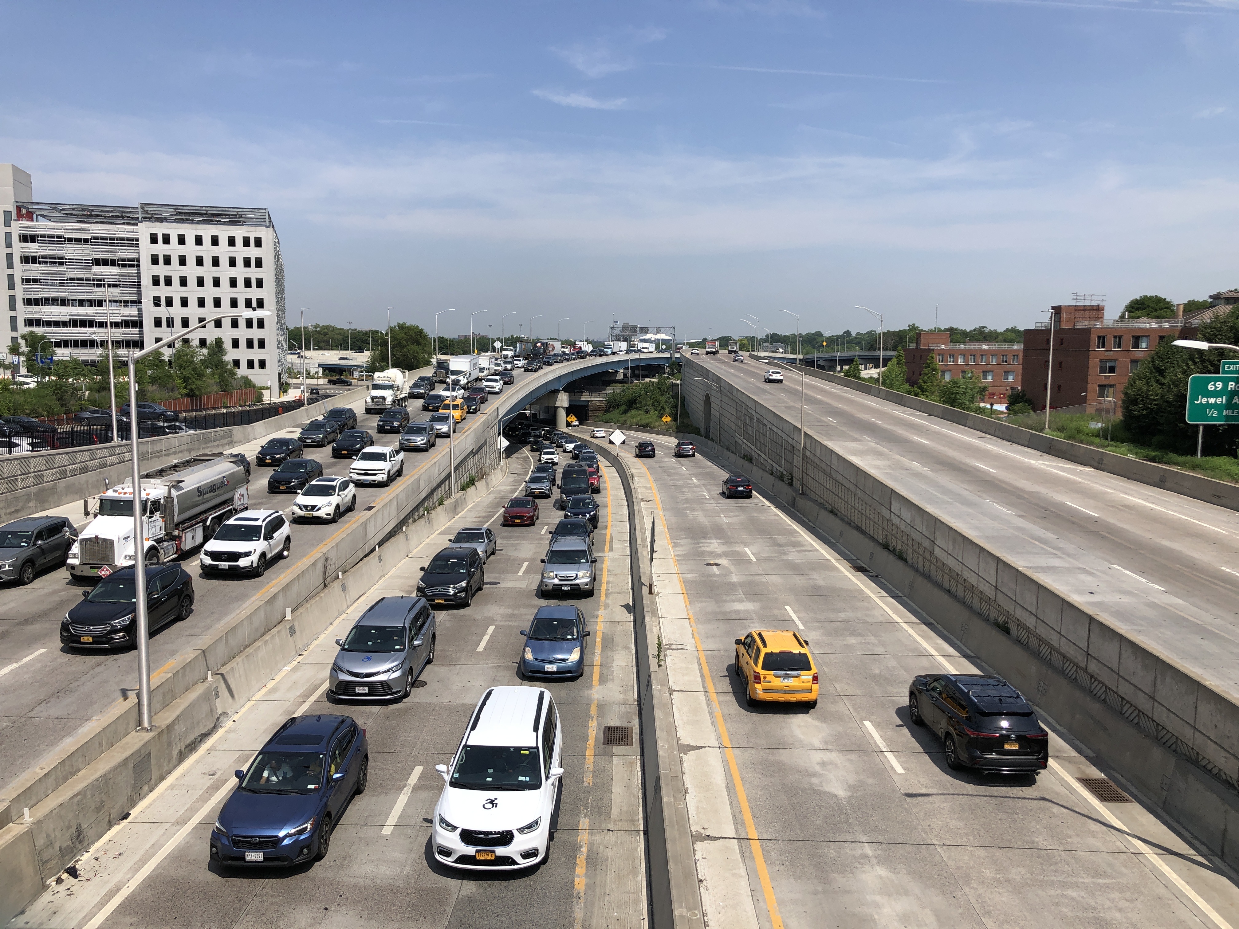 View north along the Van Wyck Expressway from the pedestrian overpass at 82nd Avenue in Briarwood Queens showing the highway that forms the neighborhood western boundary