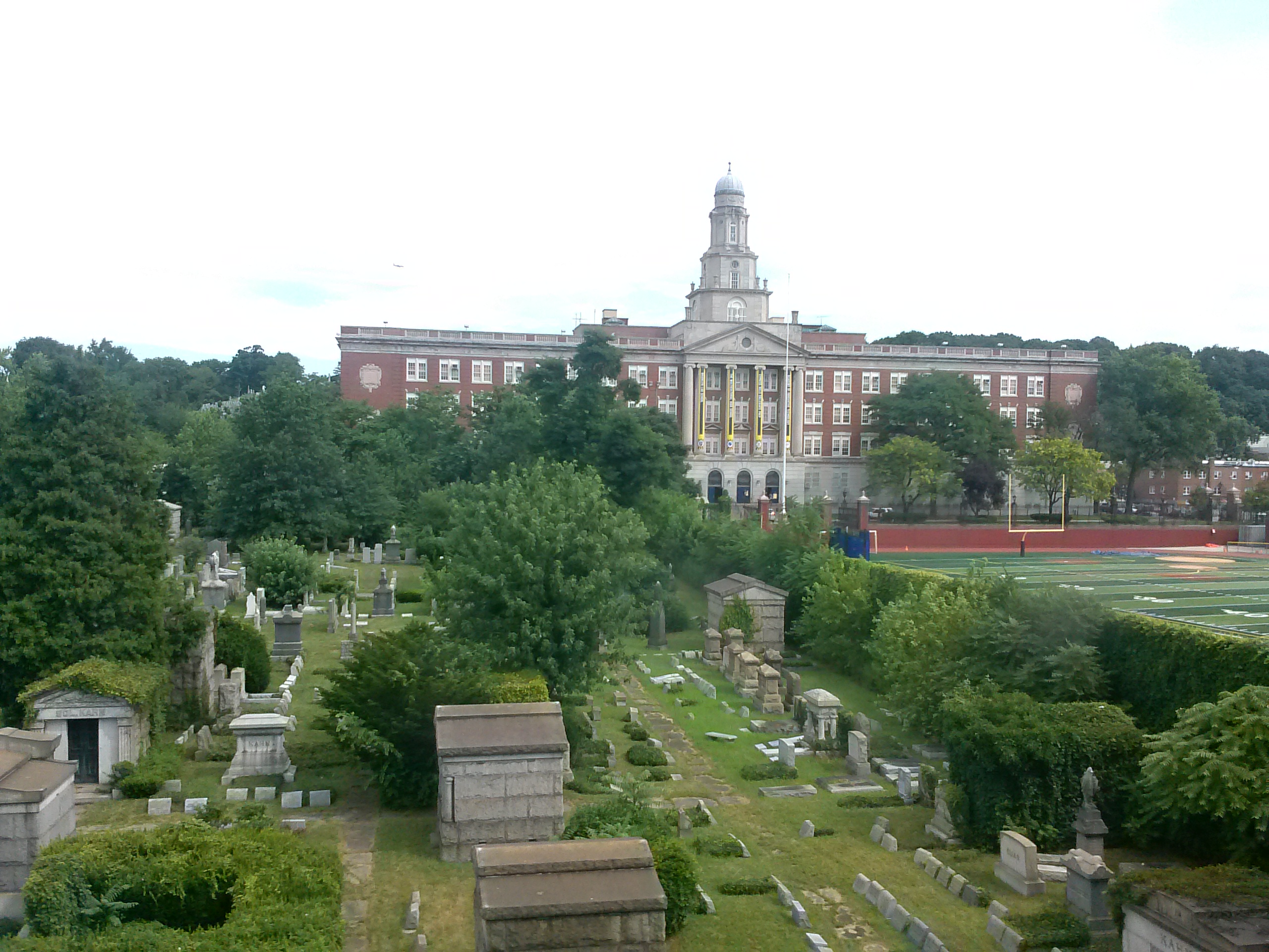 Cypress Hills Cemetery on Jamaica Avenue, founded 1848, showing the designed landscape of the 225-acre non-sectarian burial ground with mature trees and memorial monuments
