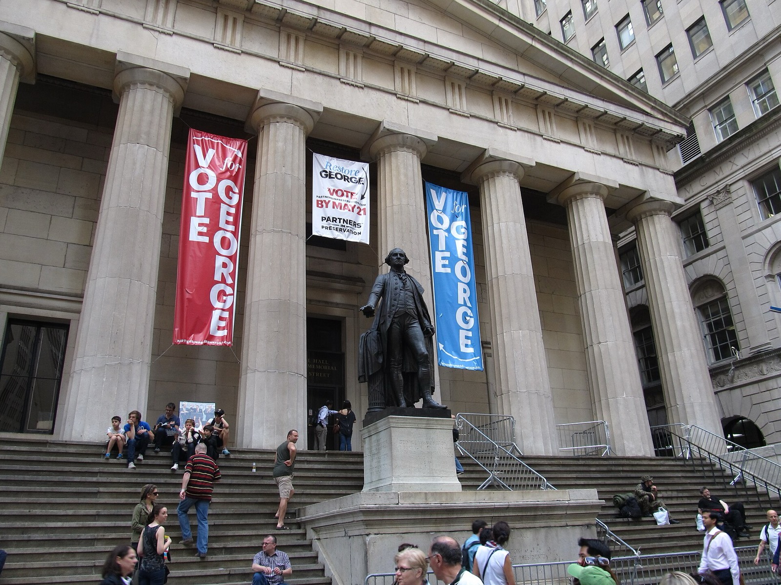 George Washington statue and the Greek Revival columns of Federal Hall National Memorial on Wall Street, where Washington took the oath of office as the first President of the United States in 1789