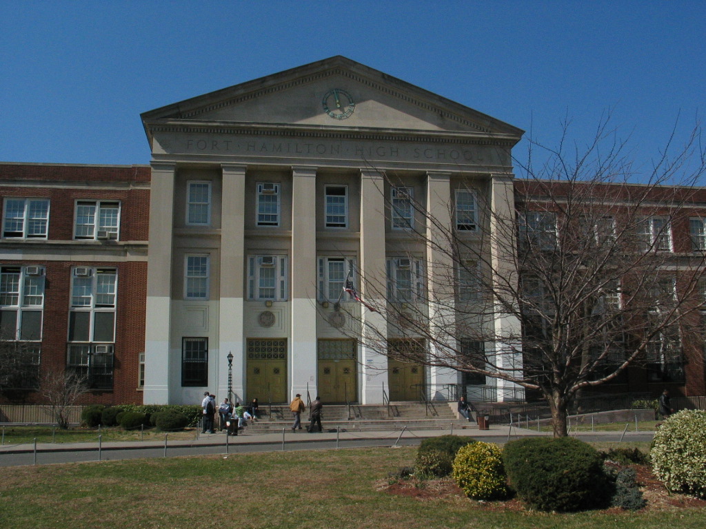 Fort Hamilton High School on Marine Avenue, built in 1941 in the Art Deco institutional style, with the large athletic facilities characteristic of WPA-era school construction