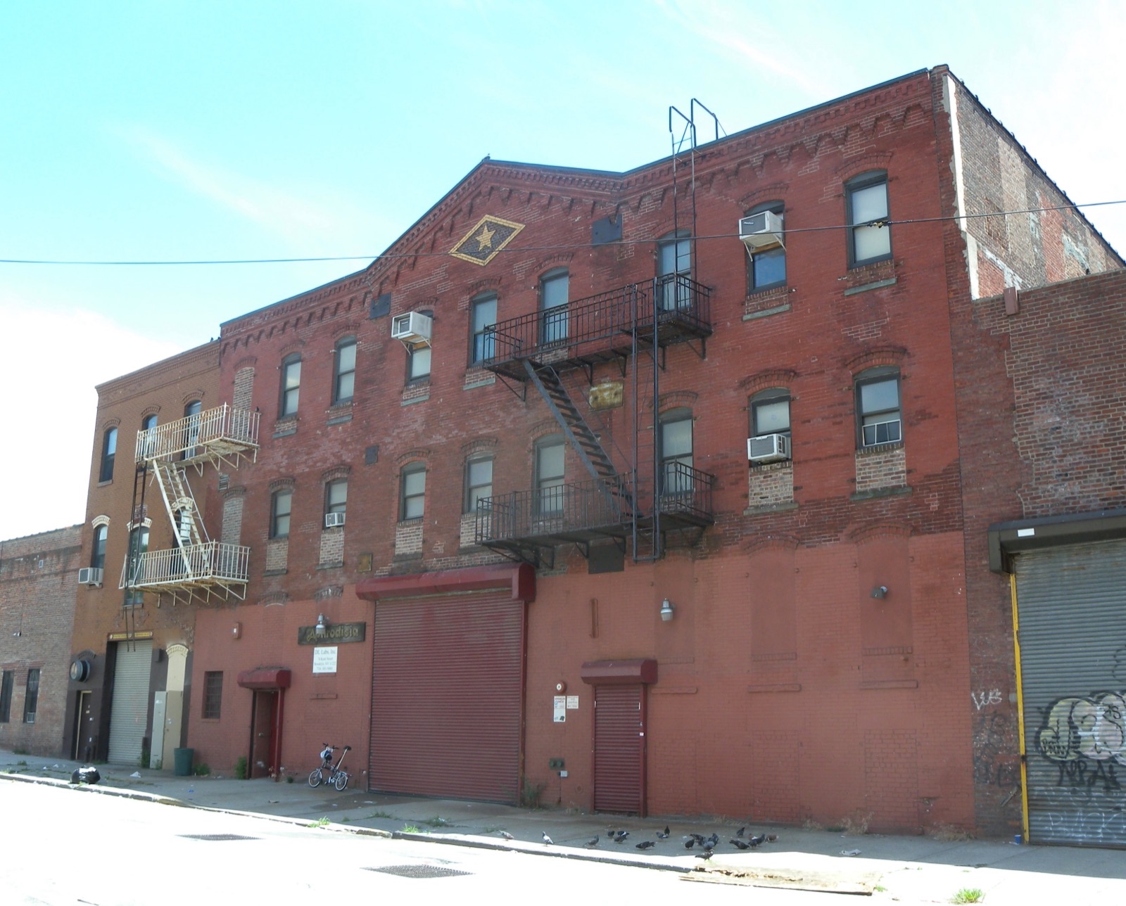 The Eberhard Faber Pencil Factory star building on West Street in Greenpoint, part of the nine-building historic district landmarked in 2007 and now converted to residential and commercial use