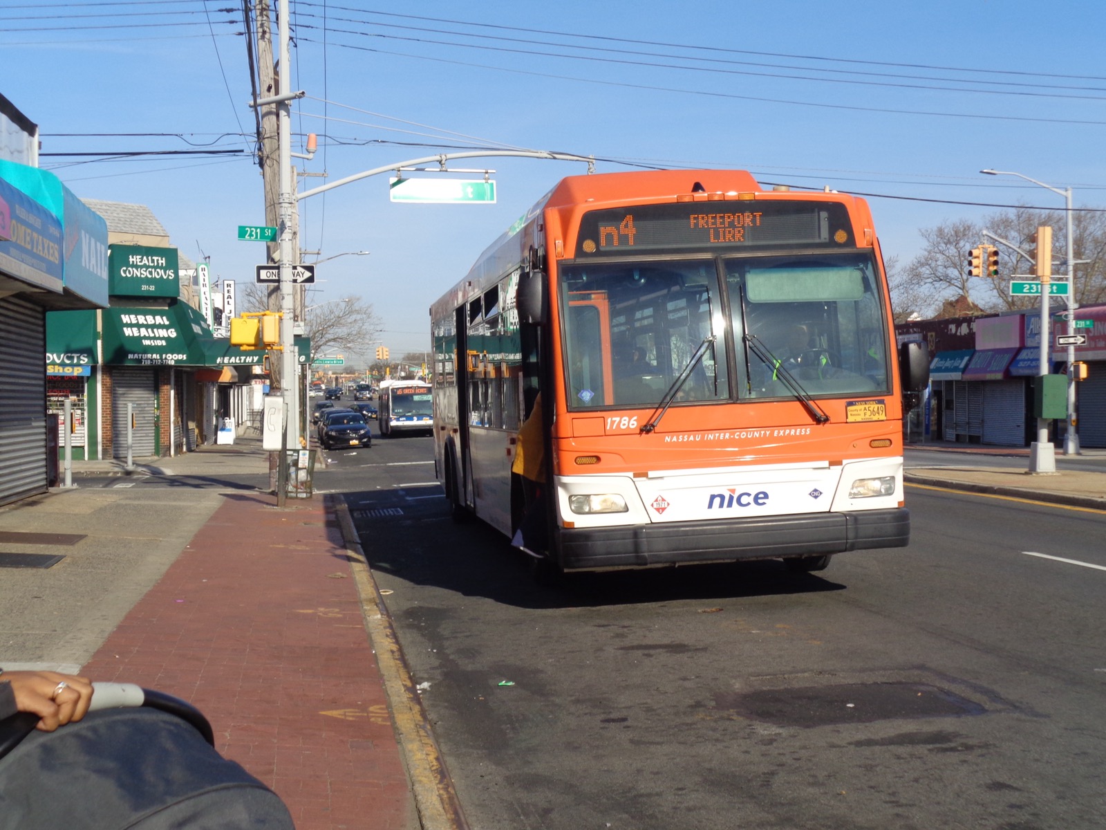 Merrick Boulevard at 231st Street in Laurelton, the commercial spine of the neighborhood with Caribbean restaurants, bakeries, and community businesses