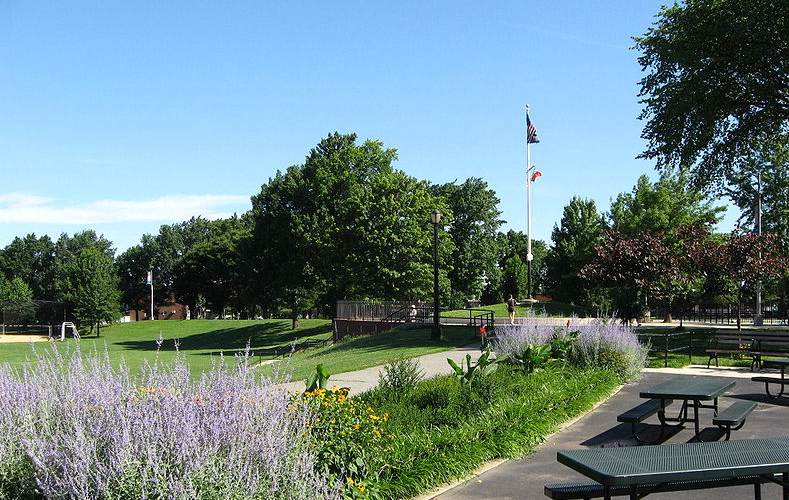Juniper Valley Park in Maspeth and Middle Village showing the athletic fields, running track, and mature trees of the 55-acre neighborhood park that serves as the primary green space for both communities
