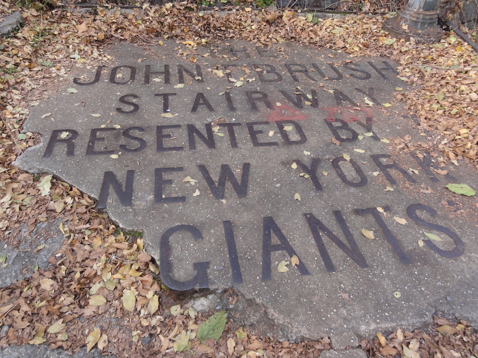 The John T. Brush Stairway descending Coogan's Bluff, the 1913 concrete staircase that carried millions of baseball fans down to the Polo Grounds stadium