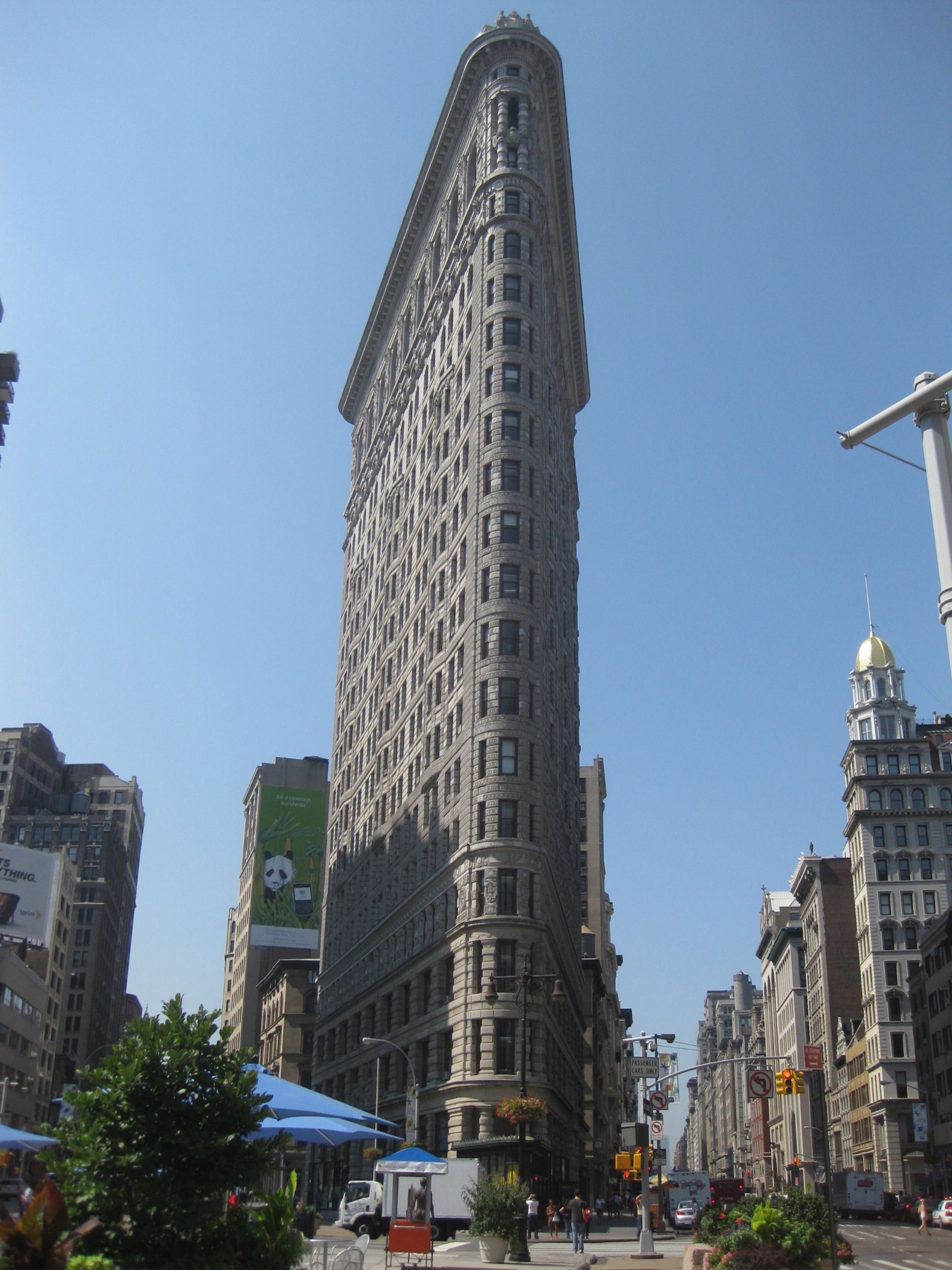 Madison Square Park at the western edge of Rose Hill, Manhattan, with the Flatiron Building visible beyond the trees
