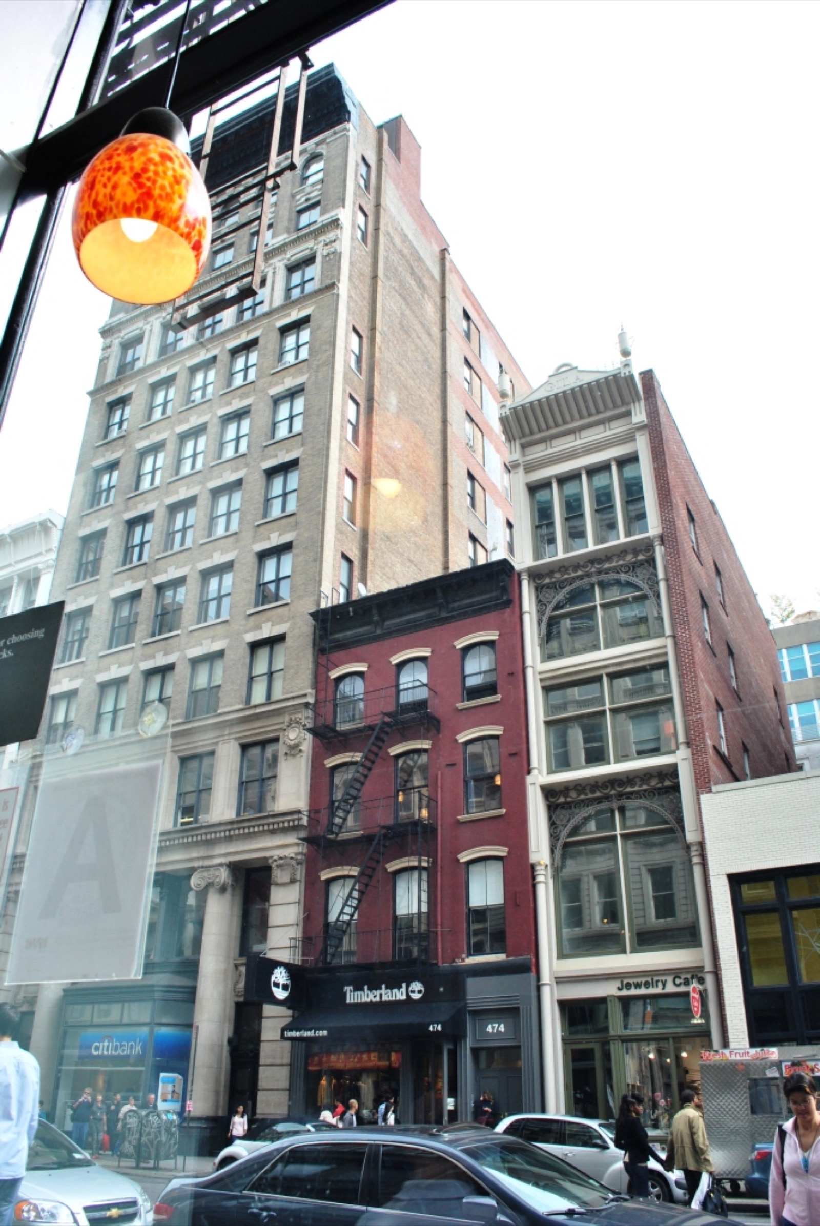 Cast-iron building detail in the SoHo Historic District showing ornate columns and arched window frames typical of the neighborhood's 19th-century commercial loft architecture