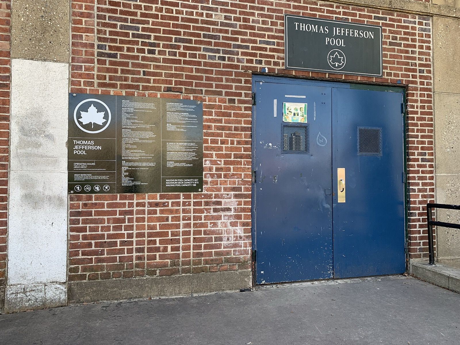 Thomas Jefferson Pool entrance at First Avenue and 112th Street in Spanish Harlem, one of the most heavily used public pools in upper Manhattan and a critical summer gathering place for El Barrio