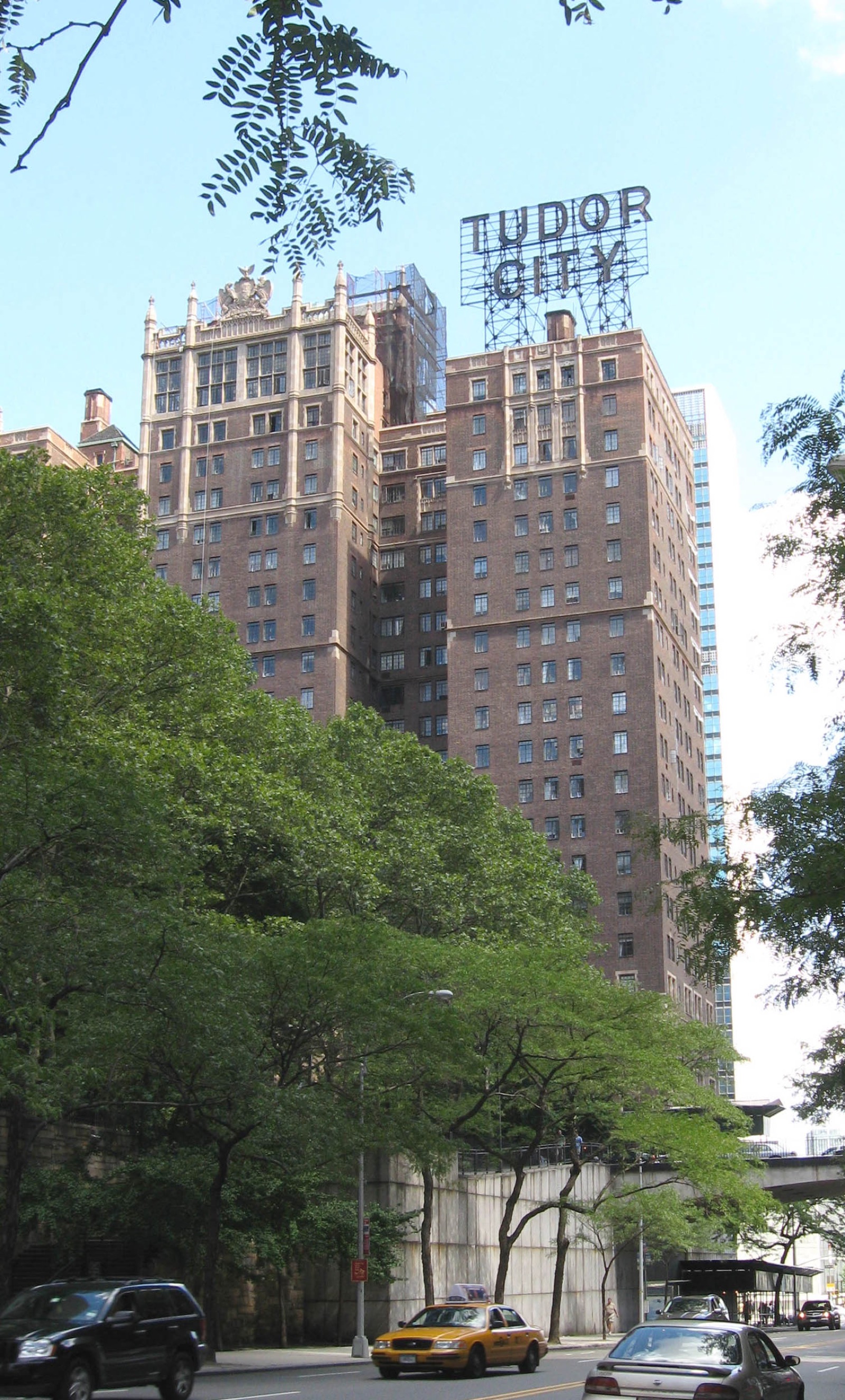 The Tudor City apartment towers and their rooftop sign seen looking east along 42nd Street